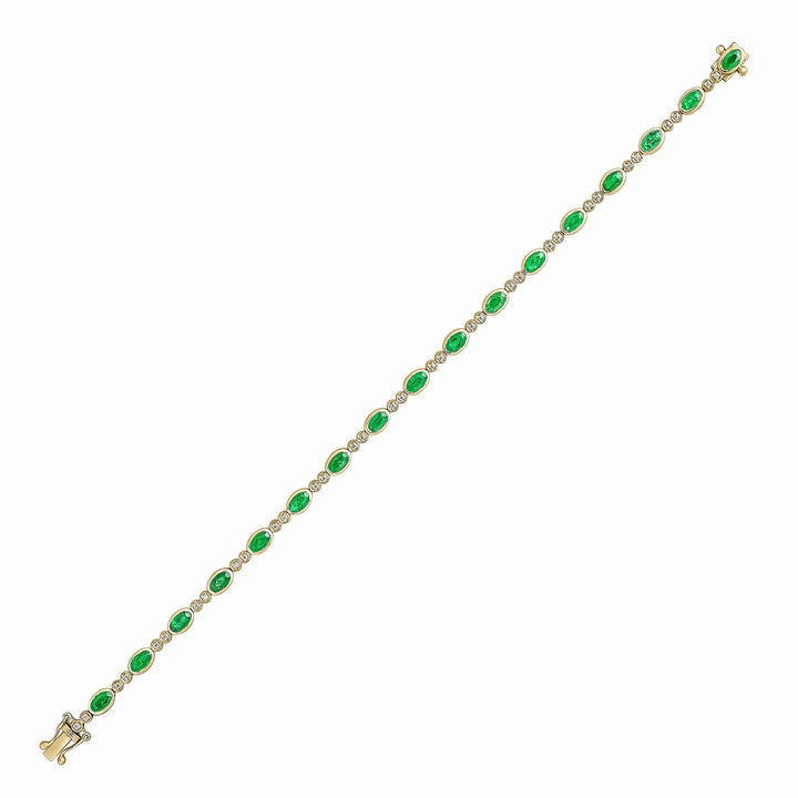 18ct Gold yellow and white gold oval emerald and brilliant cut diamond bracelet