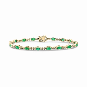 18ct Gold yellow and white gold oval emerald and brilliant cut diamond bracelet