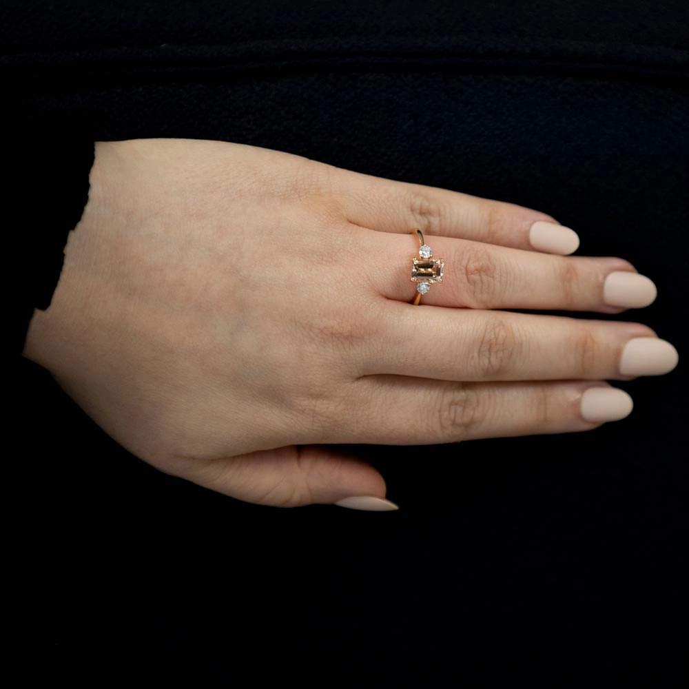 18ct Rose Gold 1.63ct Emerald Cut Morganite And 0.31ct Round Brilliant Cut Diamond Three Stone Ring