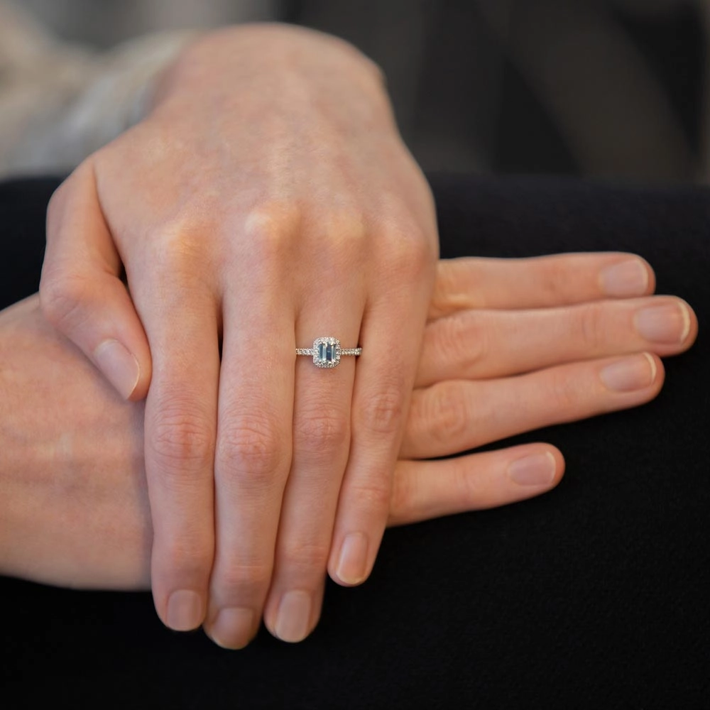 18ct White Gold 0.38ct Emerald Cut Aquamarine And 0.18ct Diamond Halo And Shoulders Ring