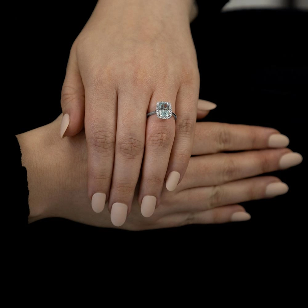 18ct White Gold 1.84ct Radiant Cut Aquamarine With 0.27ct Diamond Halo Ring