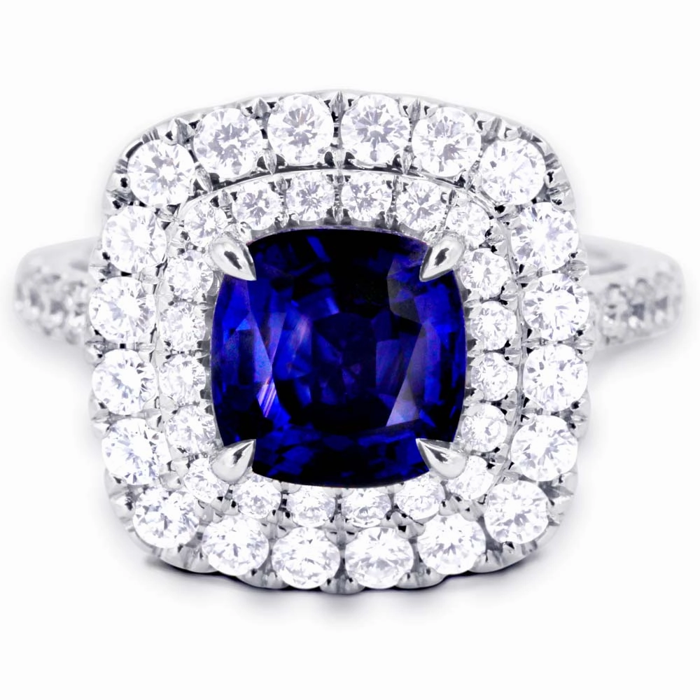18ct White Gold 2.33ct Cushion Cut Blue Sapphire And 1.08ct Double Diamond Halo Ring