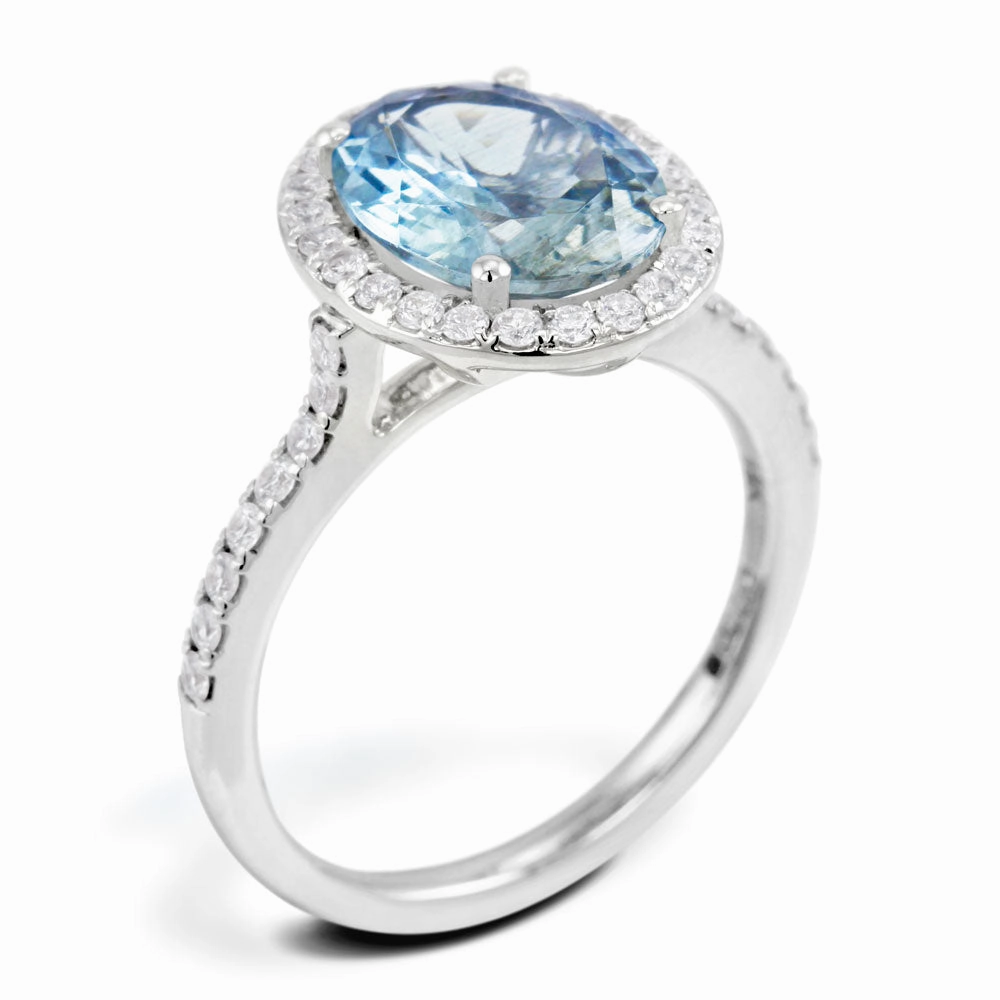 18ct White Gold 2.49ct Oval Cut Aquamarine With 0.40ct Diamond Halo and Diamond Set Shoulders Ring