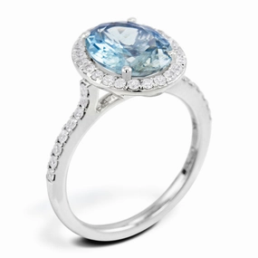 18ct White Gold 2.49ct Oval Cut Aquamarine With 0.40ct Diamond Halo and Diamond Set Shoulders Ring