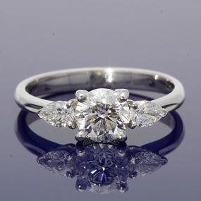 18ct White Gold Certificated 0.90ct Diamond Trilogy Ring with Pear Shape Diamond Set Shoulders