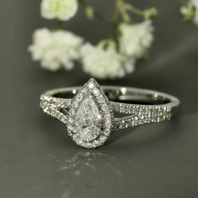 18ct White Gold Certificated Pear Cut Diamond Halo Ring