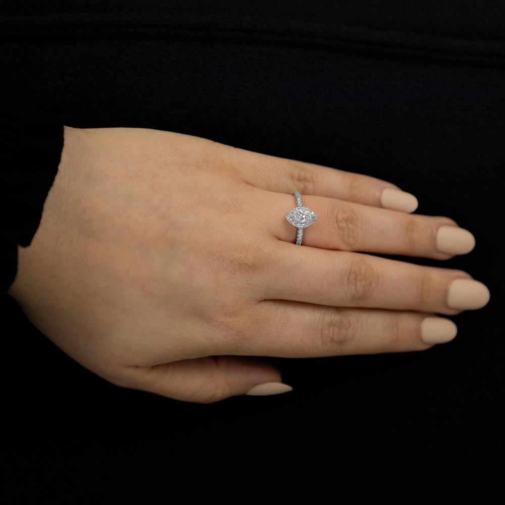 Platinum 0.89ct Marquise And Round Brilliant Cut Diamond Engagement Ring With Diamond Halo And Diamond Set Shoulders