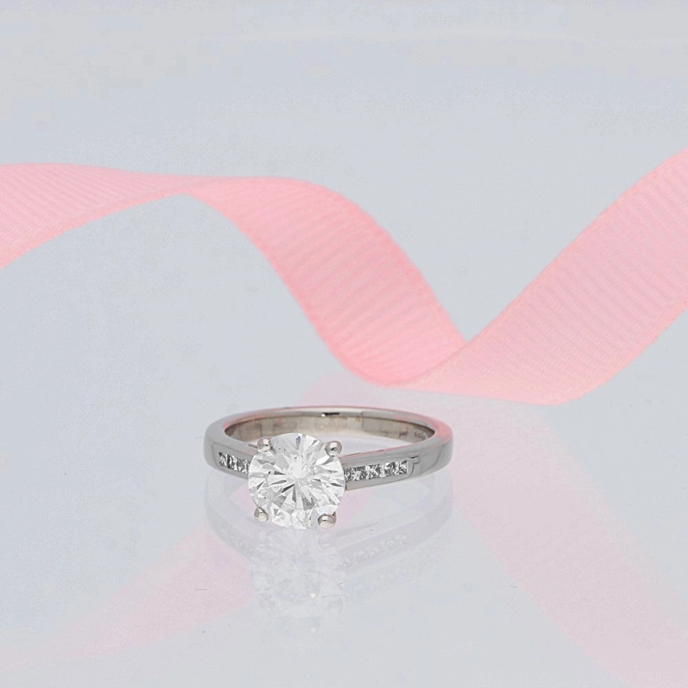 Platinum 1.50ct Round Diamond & Princess Cut Diamond Set Shoulders Ring