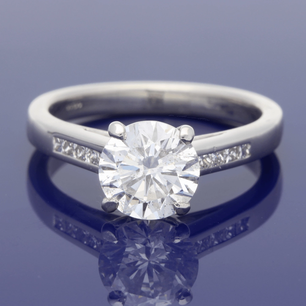 Platinum 1.50ct Round Diamond & Princess Cut Diamond Set Shoulders Ring