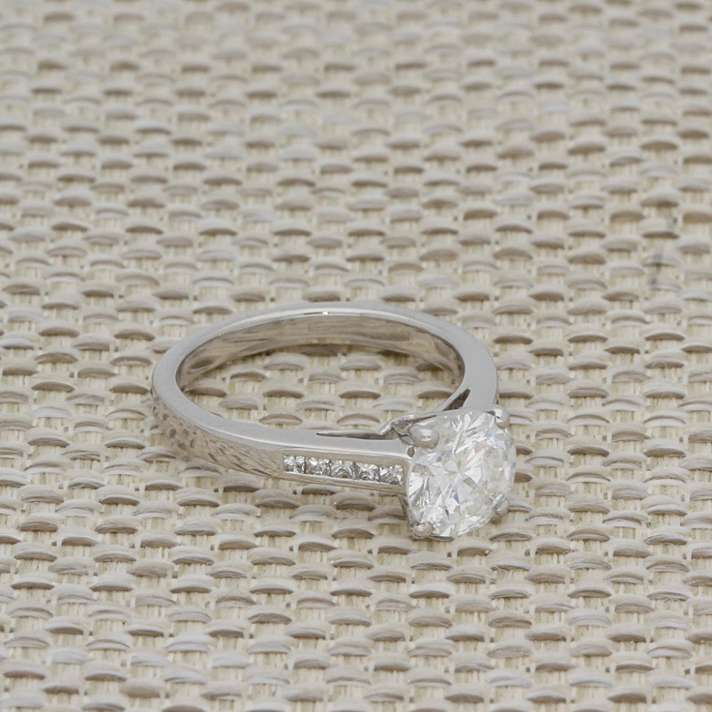 Platinum 1.50ct Round Diamond & Princess Cut Diamond Set Shoulders Ring