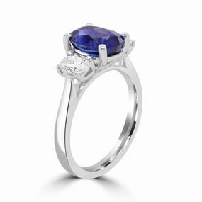 Platinum 2.63ct Oval Cut Sapphire And 0.63ct Diamond Three Stone Engagement Ring