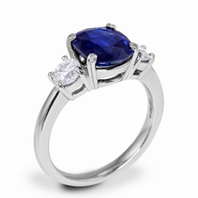 Platinum 3.08ct Cushion Cut Sapphire And 0.50ct Diamond Three Stone Engagement Ring