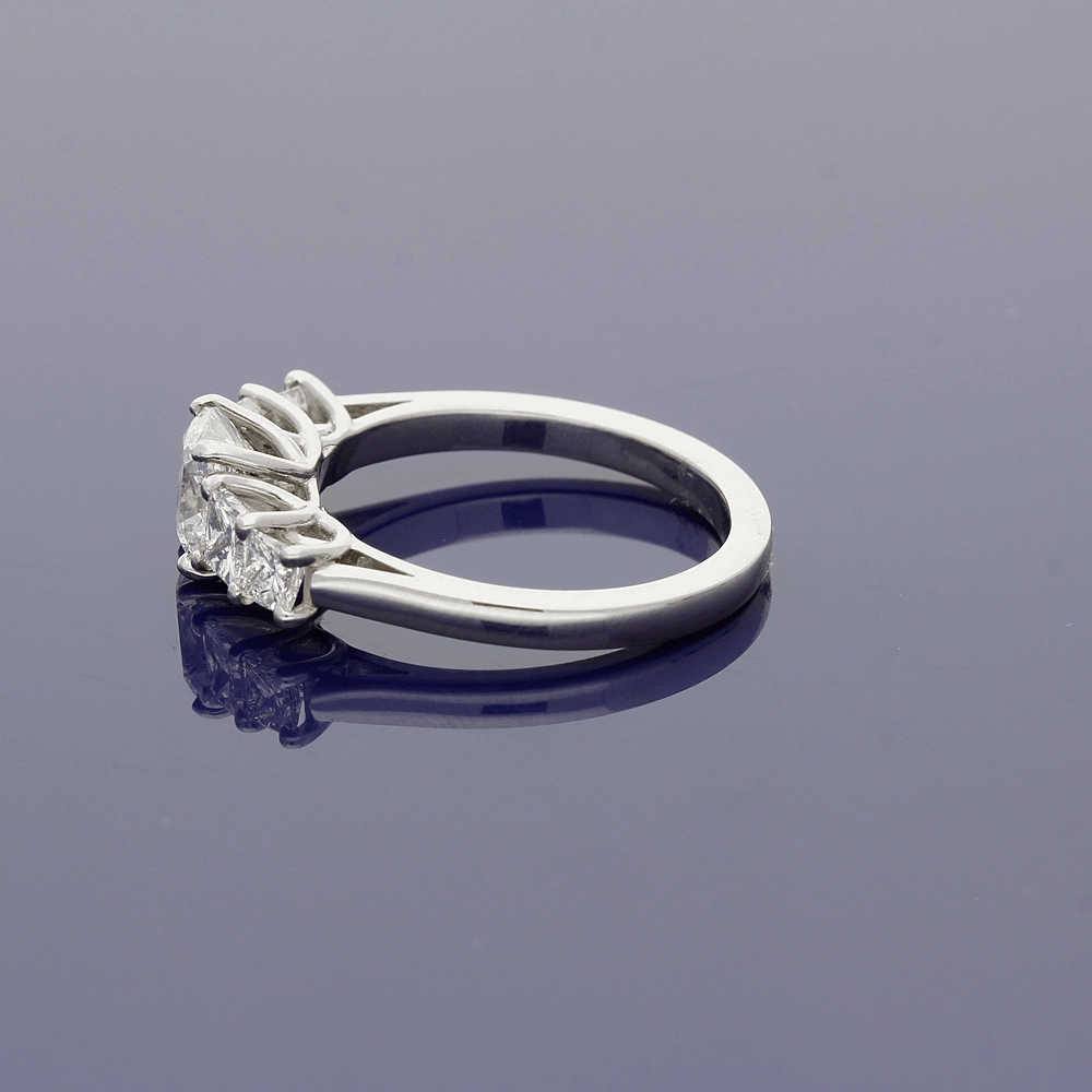 Platinum 5-Stone Ring with Cushion Cut and Princess Cut Diamonds