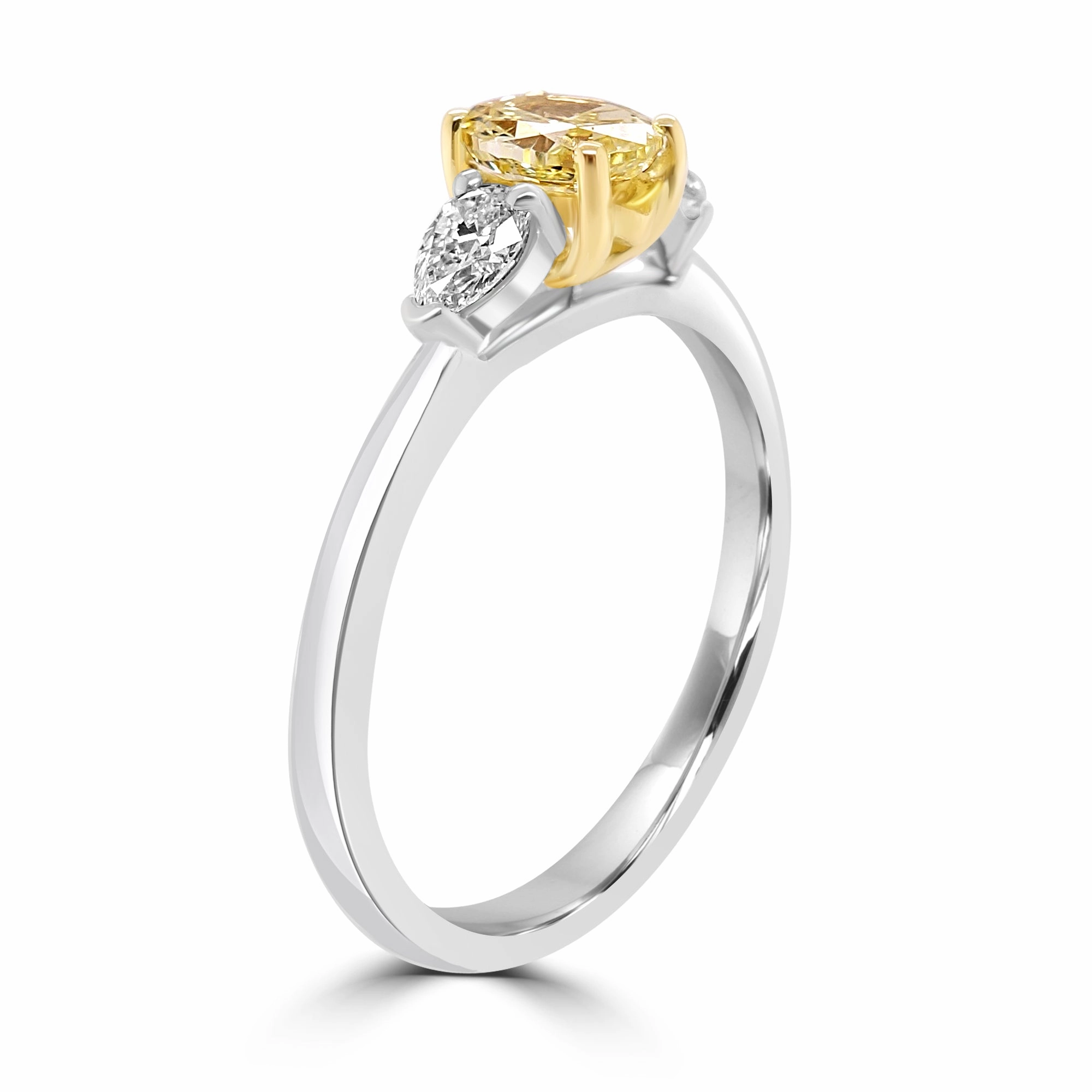 Platinum And 18ct Yellow Gold 1.02ct Oval Cut Yellow Diamond And 0.25ct Pear Cut Diamond Three Stone Ring