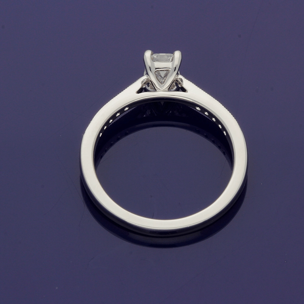 Platinum Certificated 0.53ct Emerald Cut Solitaire Ring with Diamond Shoulders