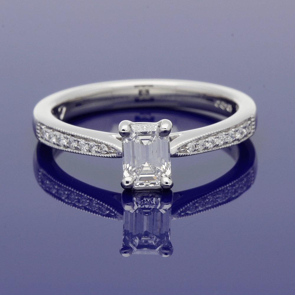 Platinum Certificated 0.53ct Emerald Cut Solitaire Ring with Diamond Shoulders
