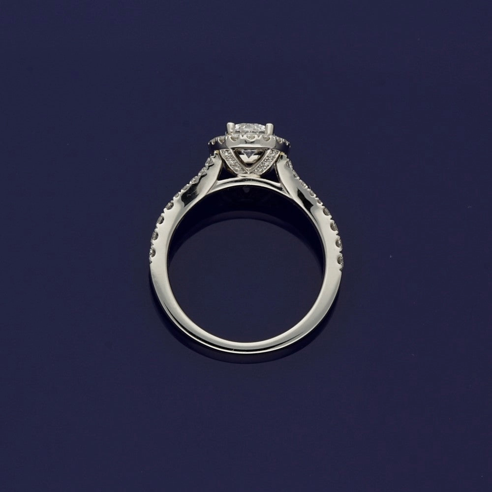 Platinum Certificated Oval Cut Diamond Halo Ring with Diamond Set Shoulders