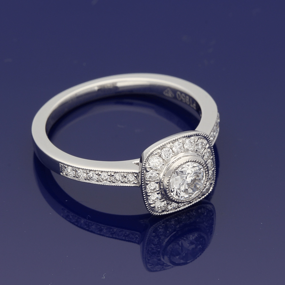 Platinum Diamond Halo Ring with Diamond Set Shoulders