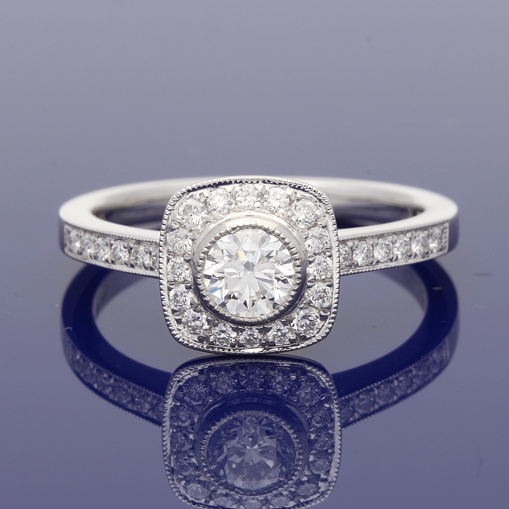 Platinum Diamond Halo Ring with Diamond Set Shoulders