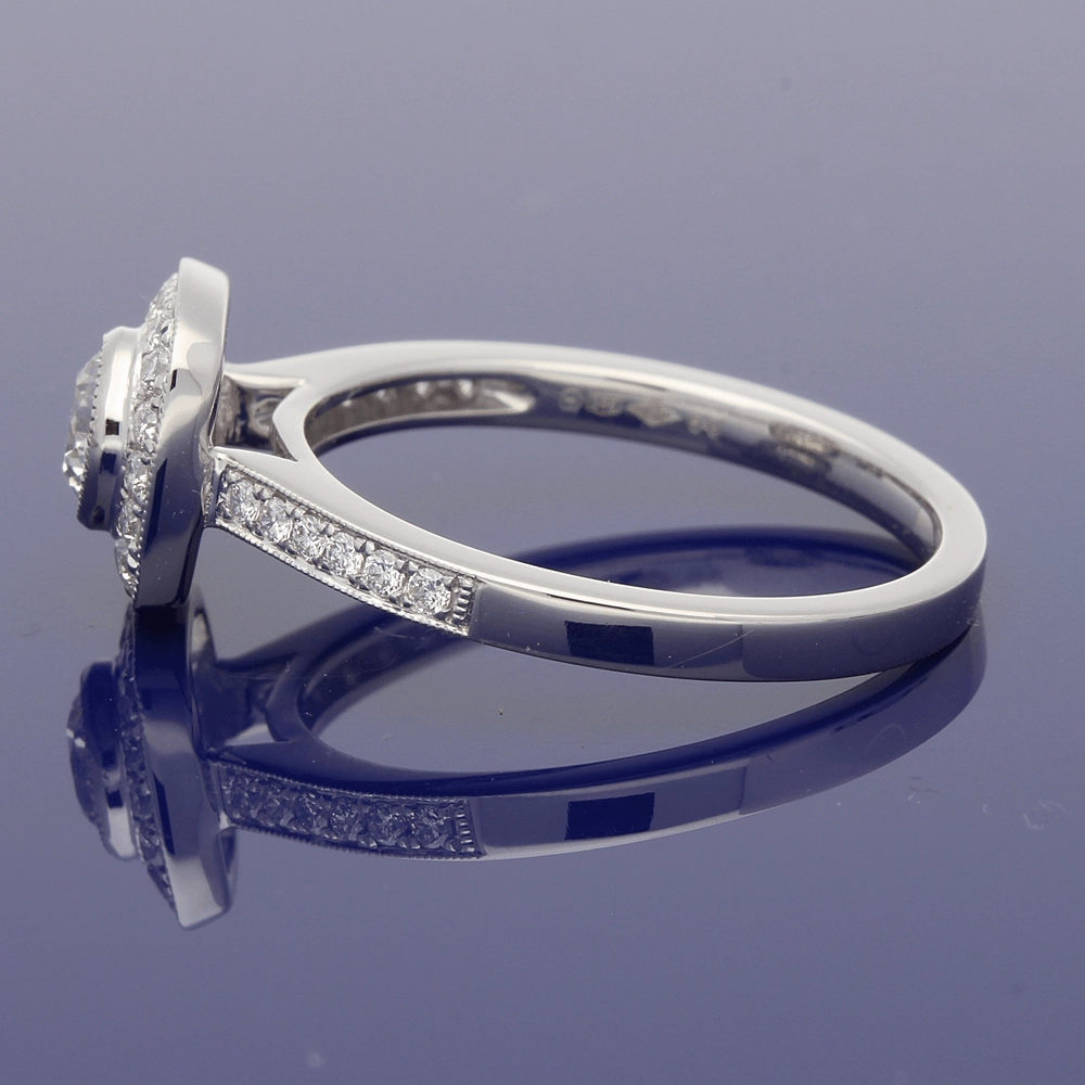 Platinum Diamond Halo Ring with Diamond Set Shoulders
