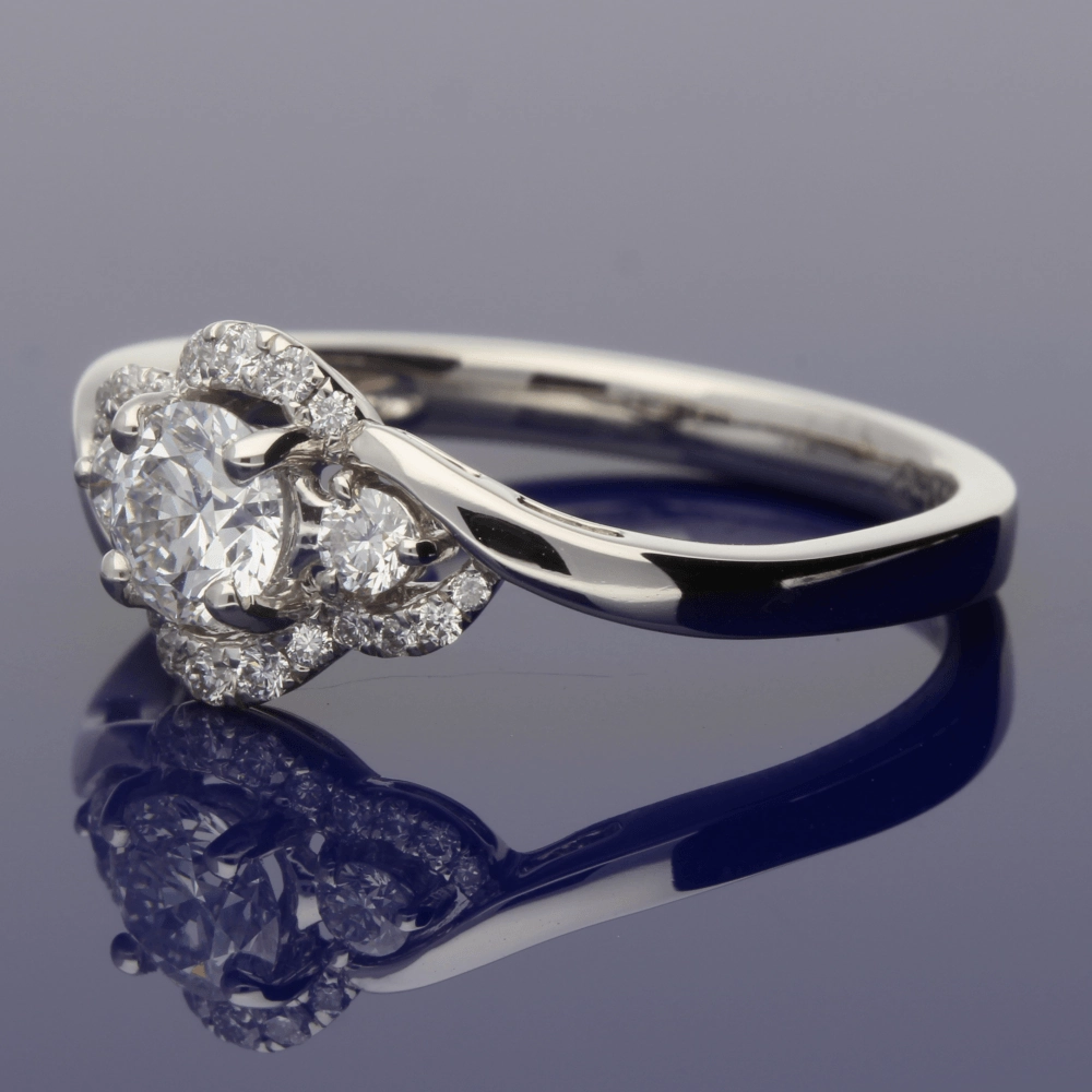 Platinum Diamond Trilogy Twist Halo Ring