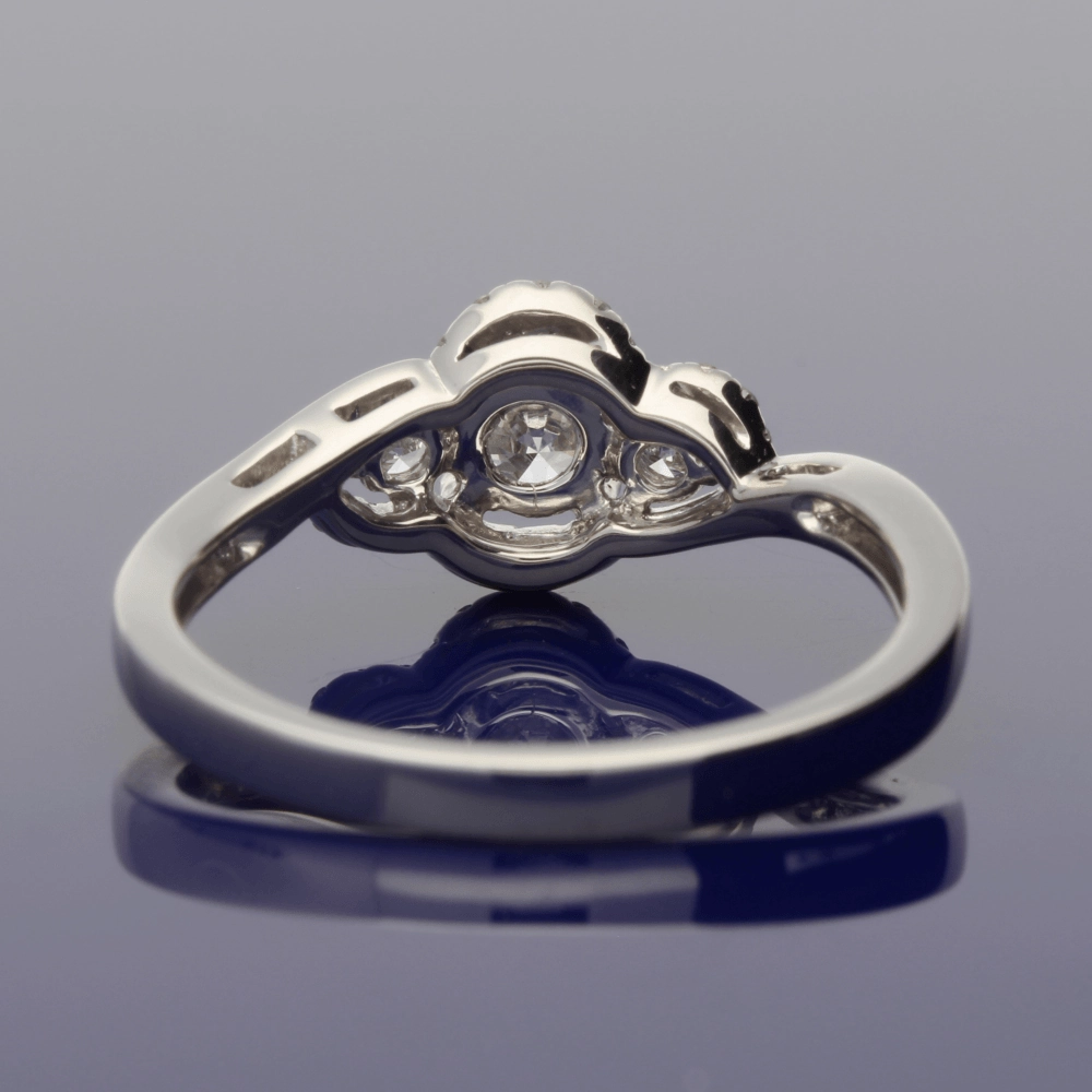 Platinum Diamond Trilogy Twist Halo Ring
