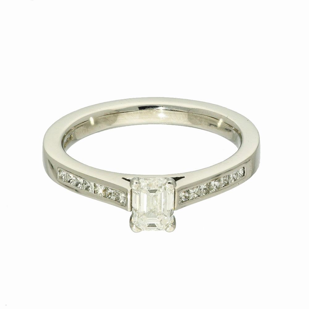 Pre-loved Platinum Certificated 0.51ct Emerald Cut Solitaire Ring with Princess Diamond Shoulders