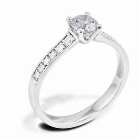 The Cassia Platinum Round Brilliant Cut Diamond Solitaire Engagement Ring With Diamond Set Shoulders