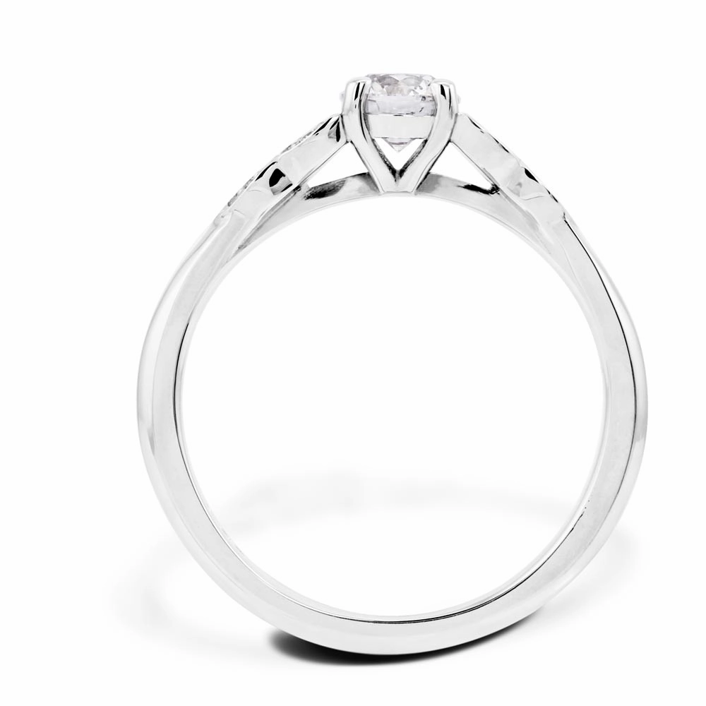 The Fleur Platinum Round Brilliant Cut Diamond Solitaire Engagement Ring With Diamond Leaf Detailing