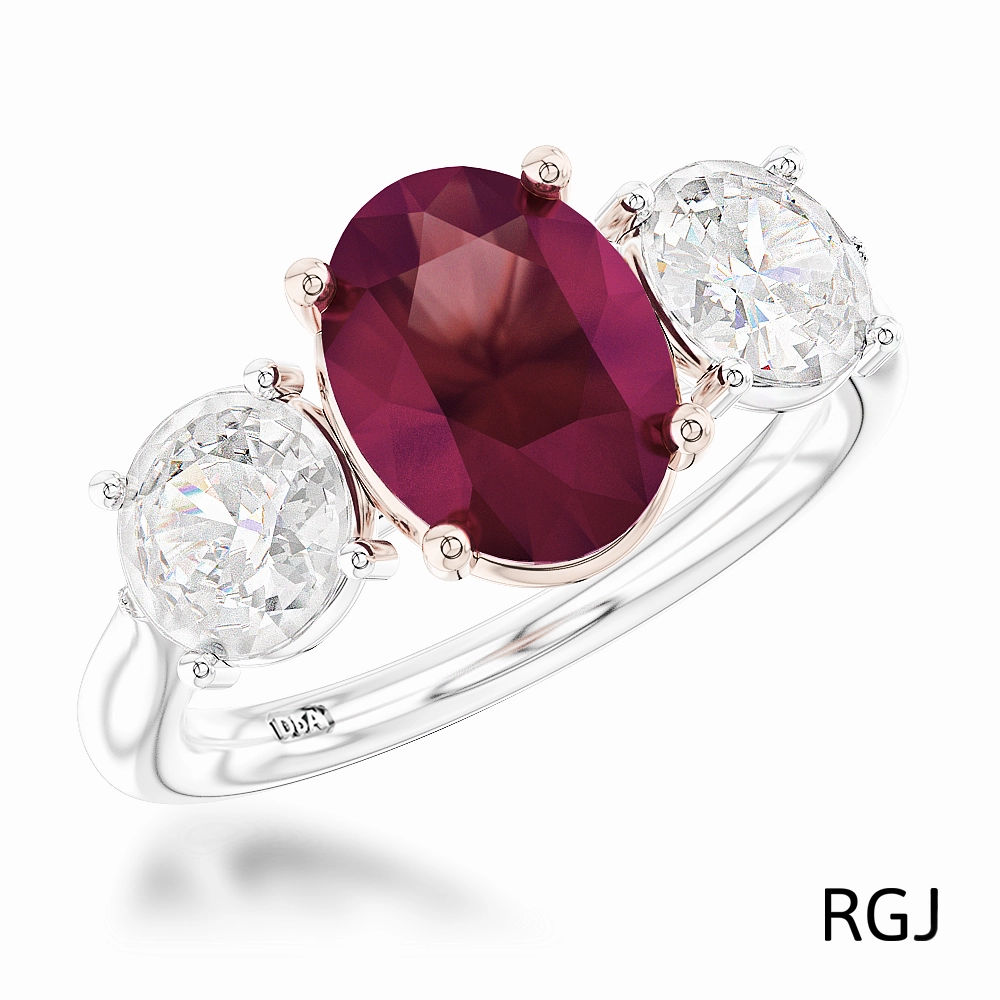 The Florentina Iconic Platinum And 18ct Rose Gold 2.04ct Oval Cut Ruby And 1.01ct Round Brilliant Cut Diamond Three Stone Ring With 0.08ct Diamond Detailing