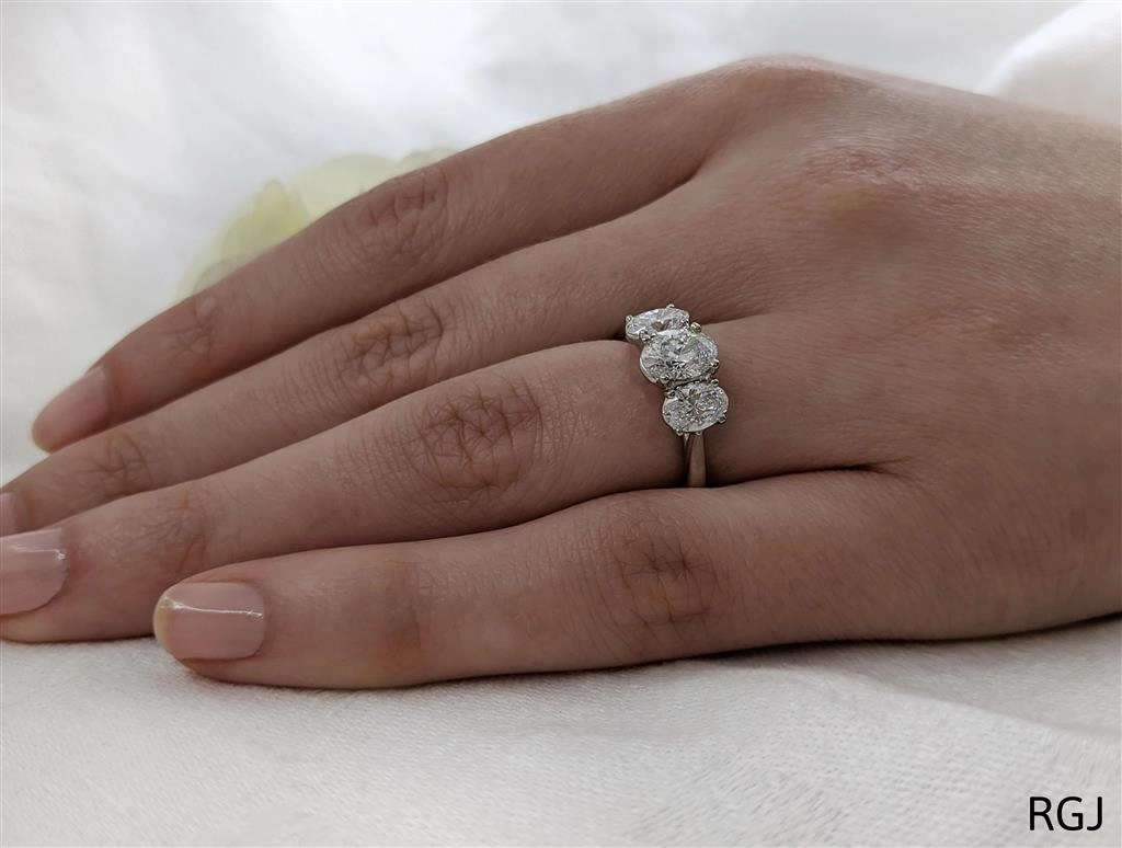 The Florentina Platinum 1.81ct Oval Cut Diamond Three Stone Engagement Ring