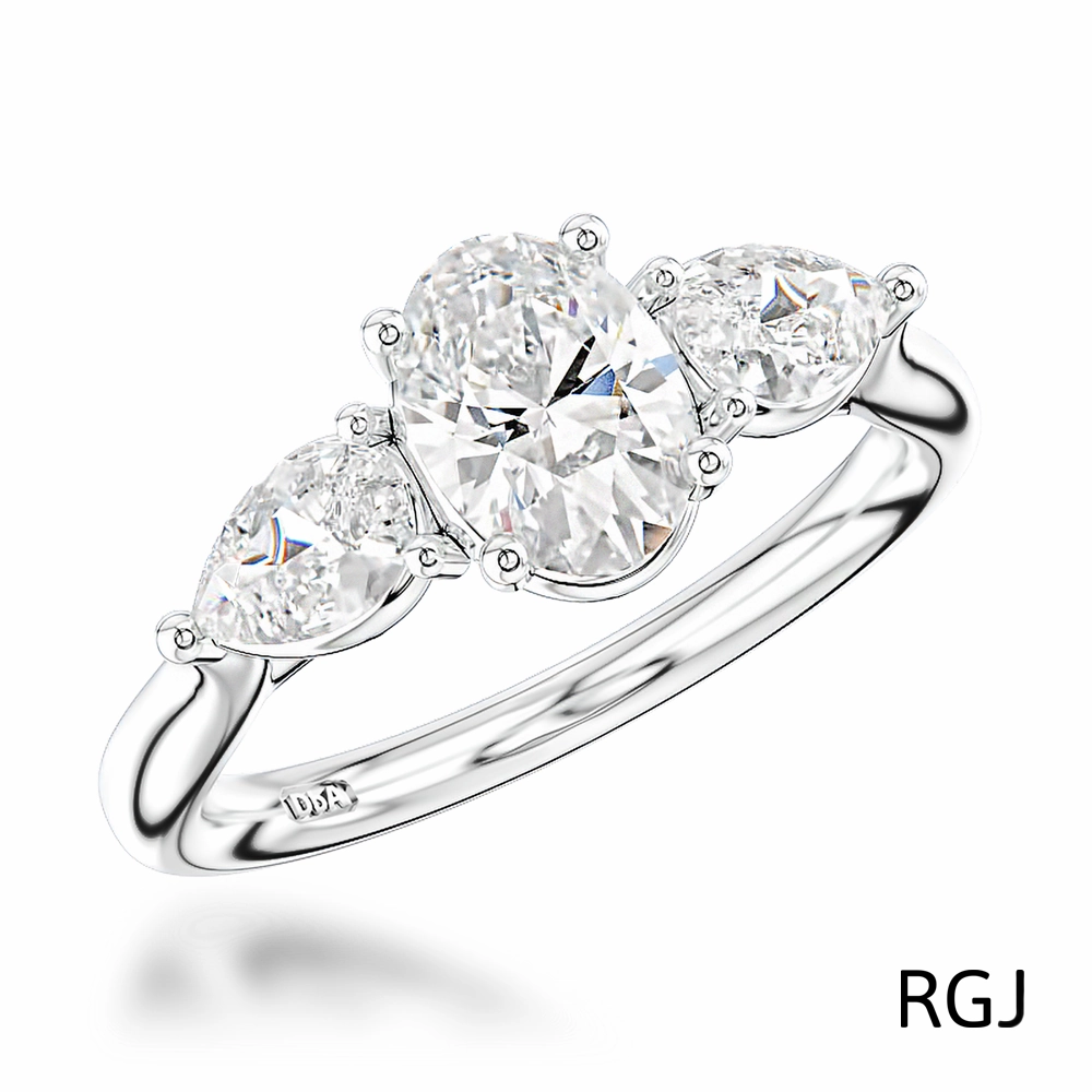 The Florentine Platinum 0.70ct Oval And 0.40ct Pear Cut Diamond Three Stone Engagement Ring
