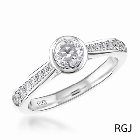 The Memoire Saona Platinum 0.41ct Round Brilliant Cut Diamond Solitaire Engagement Ring With 0.14ct Diamond Set Shoulders