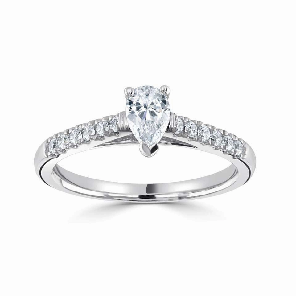 The Mistletoe Platinum Pear Cut Diamond Solitaire Engagement Ring With Diamond Set Shoulders