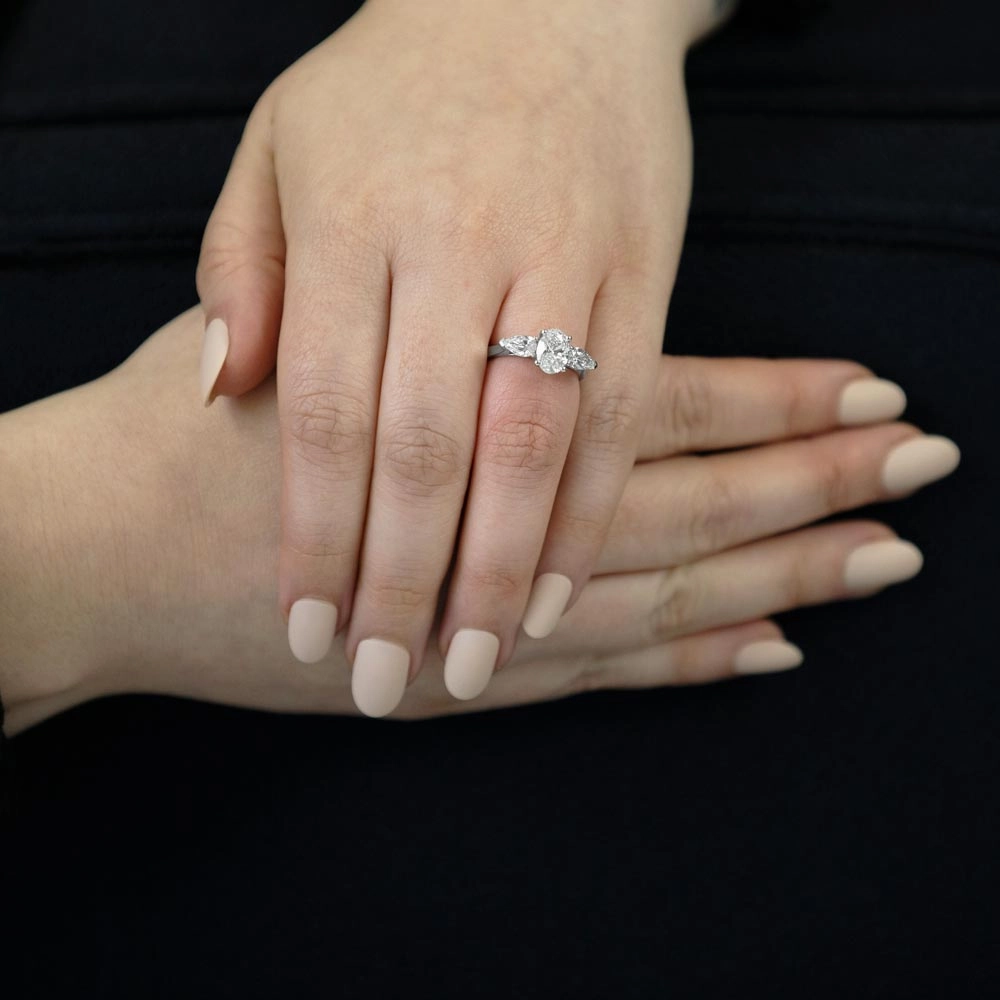 The Oval And Pear Cut Platinum Laboratory Grown Diamond Three Stone Engagement Ring