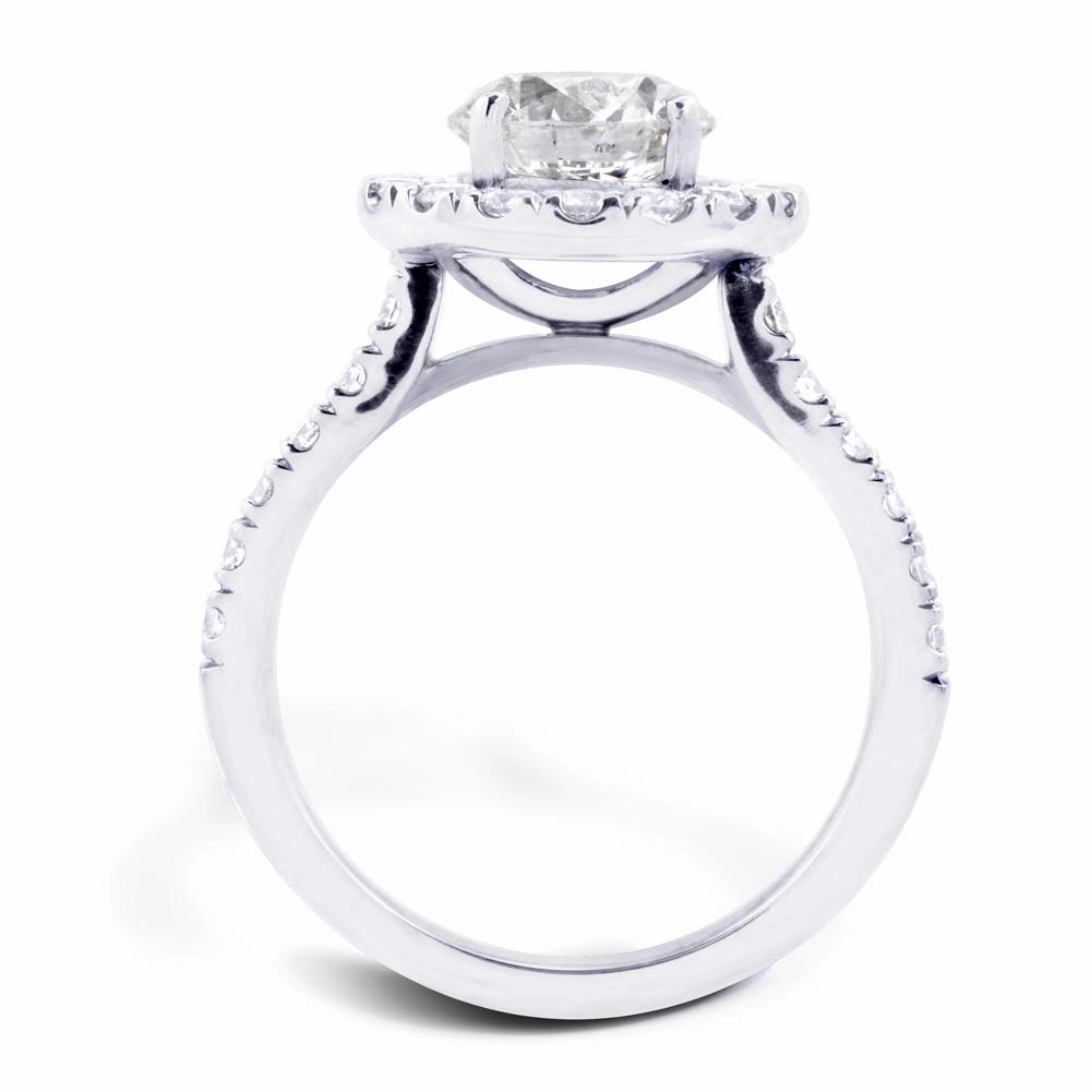 The Rosalia Platinum Round Brilliant Cut Diamond Engagement Ring With Diamond Halo And Diamond Set Shoulders