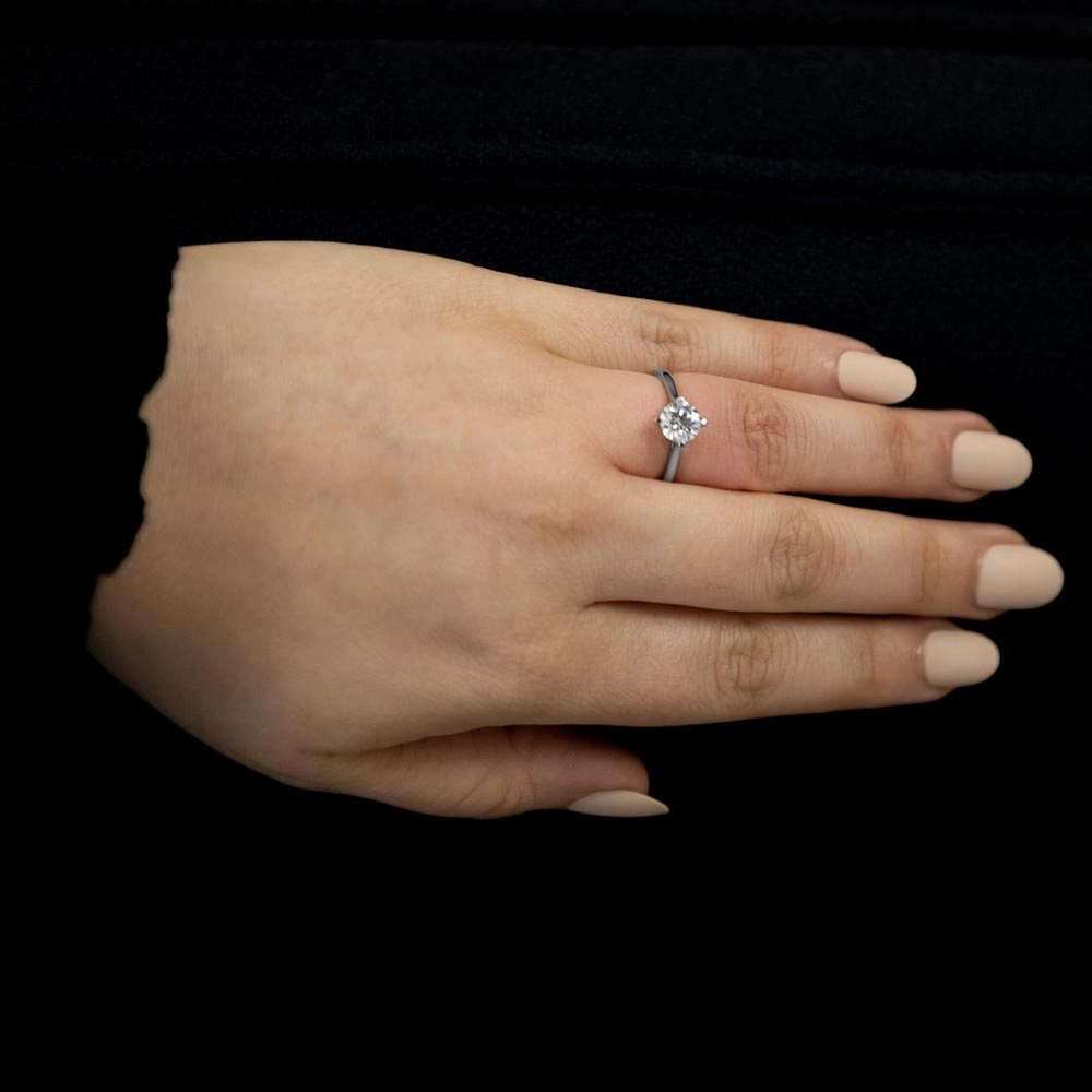 The Round Brilliant Cut Compass Set Platinum Laboratory Grown Diamond Solitaire Engagement Ring