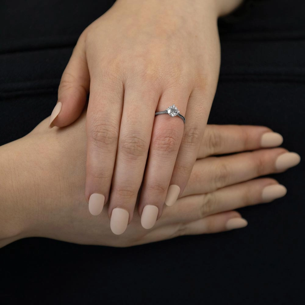 The Round Brilliant Cut Compass Set Platinum Laboratory Grown Diamond Solitaire Engagement Ring