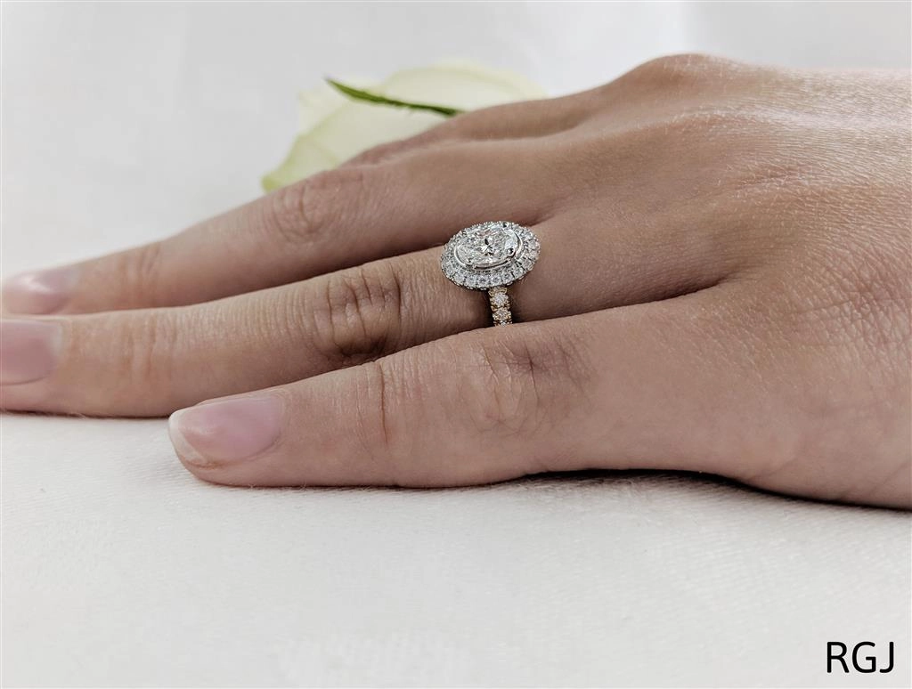 The Skye 18ct Yellow Gold And Platinum 0.50ct Oval Cut Diamond Engagement Ring With 0.33ct Diamond Halo And Diamond Set Shoulders