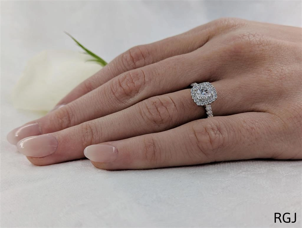 The Skye Brava Platinum 0.50ct Round Brilliant Cut Diamond Engagement Ring With 0.33ct Diamond Halo And Diamond Set Shoulders