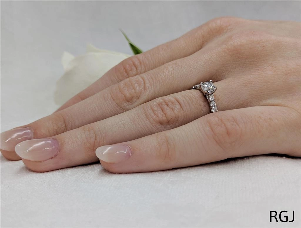The Skye Classic Platinum 0.40ct Round Brilliant Cut Diamond Solitaire Engagement Ring With 0.26ct Diamond Set Shoulders