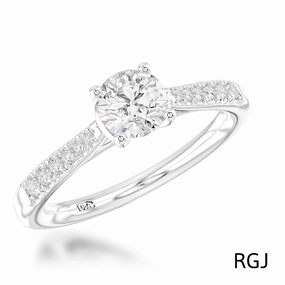 The Skye Classic Platinum 0.70ct Round Brilliant Cut Diamond Solitaire Engagement Ring With 0.19ct Diamond Set Shoulders