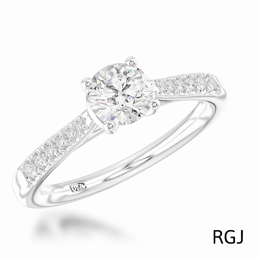 The Skye Classic Platinum 0.70ct Round Brilliant Cut Diamond Solitaire Engagement Ring With 0.19ct Diamond Set Shoulders