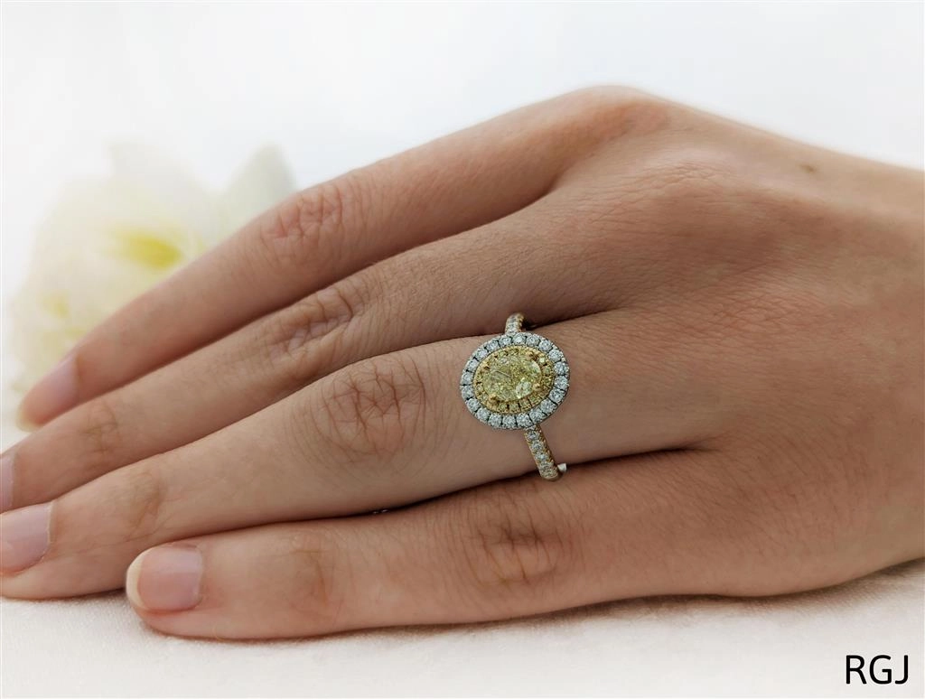 The Skye Duo 18ct Yellow Gold And Platinum 0.75ct Oval Cut Yellow Diamond Engagement Ring With 0.55ct Yellow And White Diamond Halo And Diamond Set Shoulders