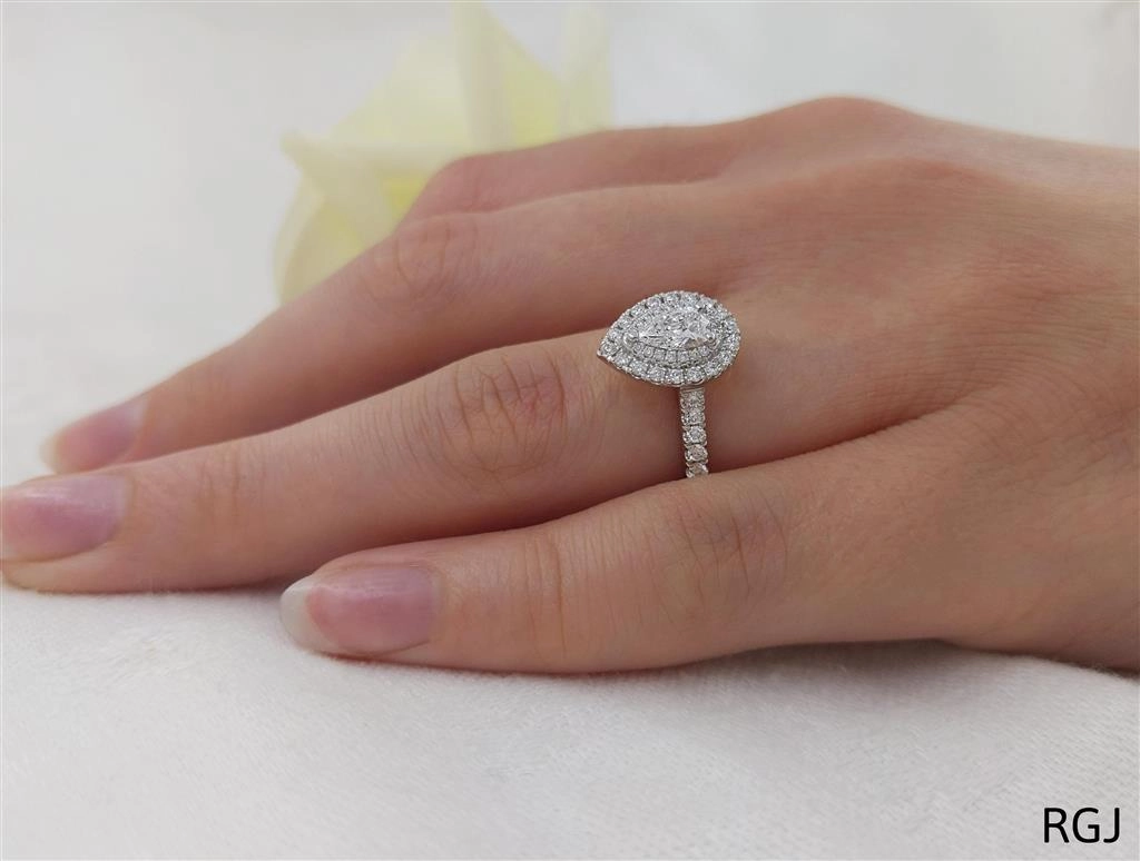 The Skye Duo Platinum 0.36ct Pear Cut Diamond Engagement Ring With 0.41ct Double Diamond Halo And Diamond Set Shoulders