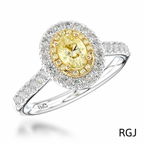 The Skye Duo Platinum And 18ct Yellow Gold 0.54ct Oval Cut Yellow Diamond Engagement Ring With 0.47ct Yellow And White Diamond Halo And Diamond Set Shoulders