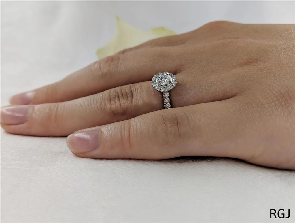 The Skye Platinum 0.30ct Round Brilliant Cut Diamond Engagement Ring With Diamond Halo And Diamond Set Shoulders