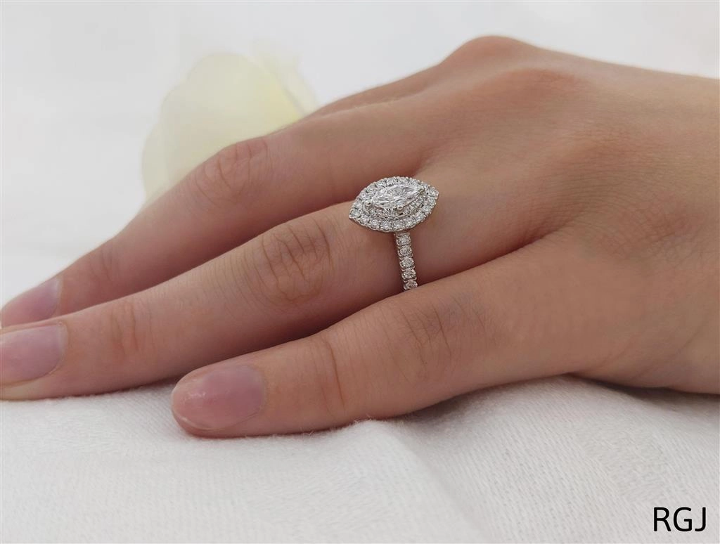 The Skye Platinum 0.38ct Marquise Cut Diamond Engagement Ring With 0.41ct Double Diamond Halo And Diamond Set Shoulders