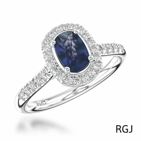 The Skye Platinum 0.67ct Cushion Cut Blue Sapphire Ring With 0.36ct Diamond Halo And Diamond Set Shoulders