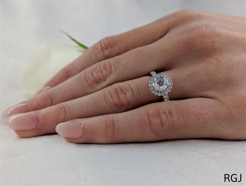 The Skye Platinum 0.71ct Round Brilliant Cut Diamond Engagement Ring With 0.37ct Diamond Halo And Diamond Set Shoulders